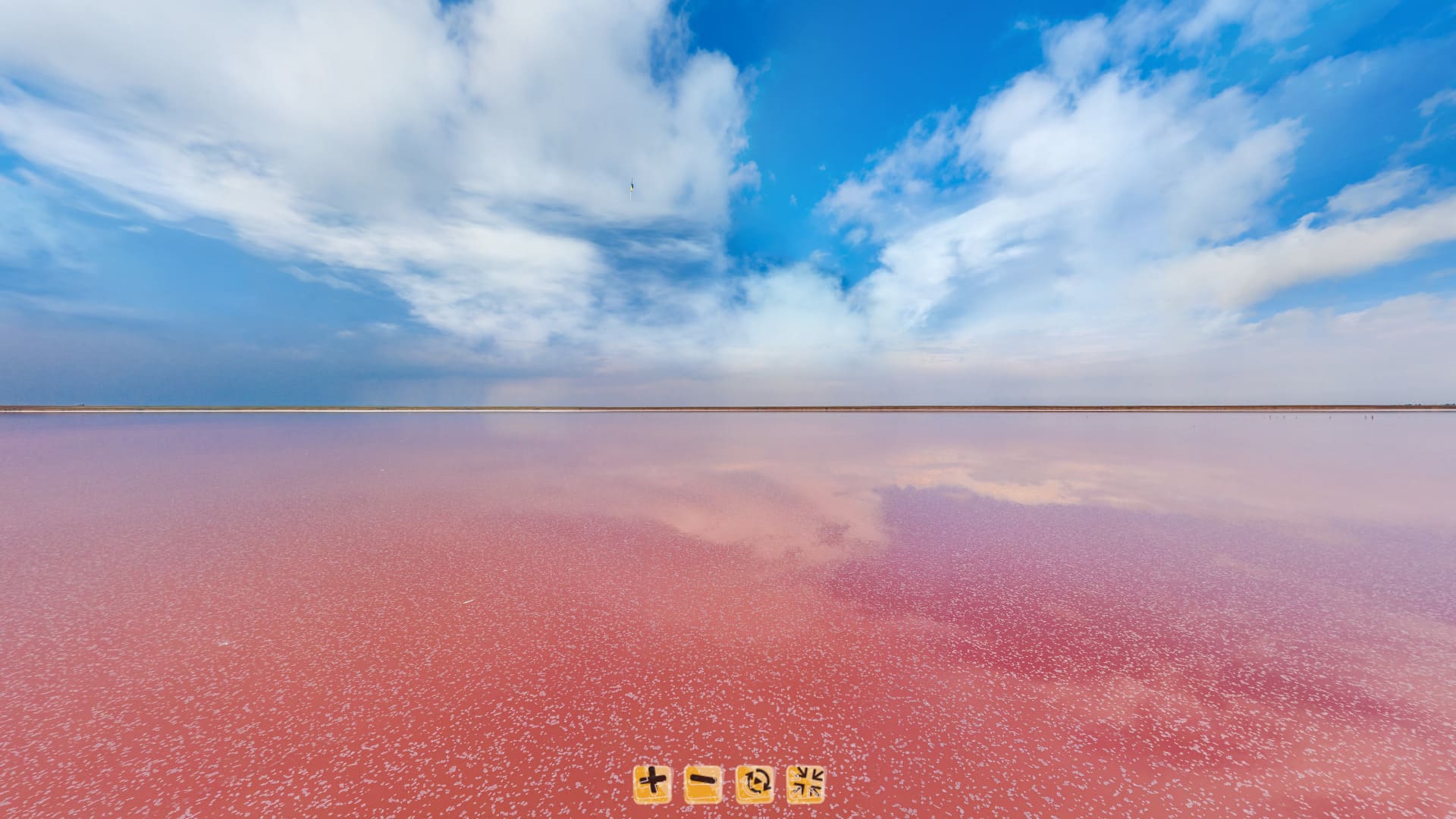 Розовое озеро с высоты от 3 до 10 метров